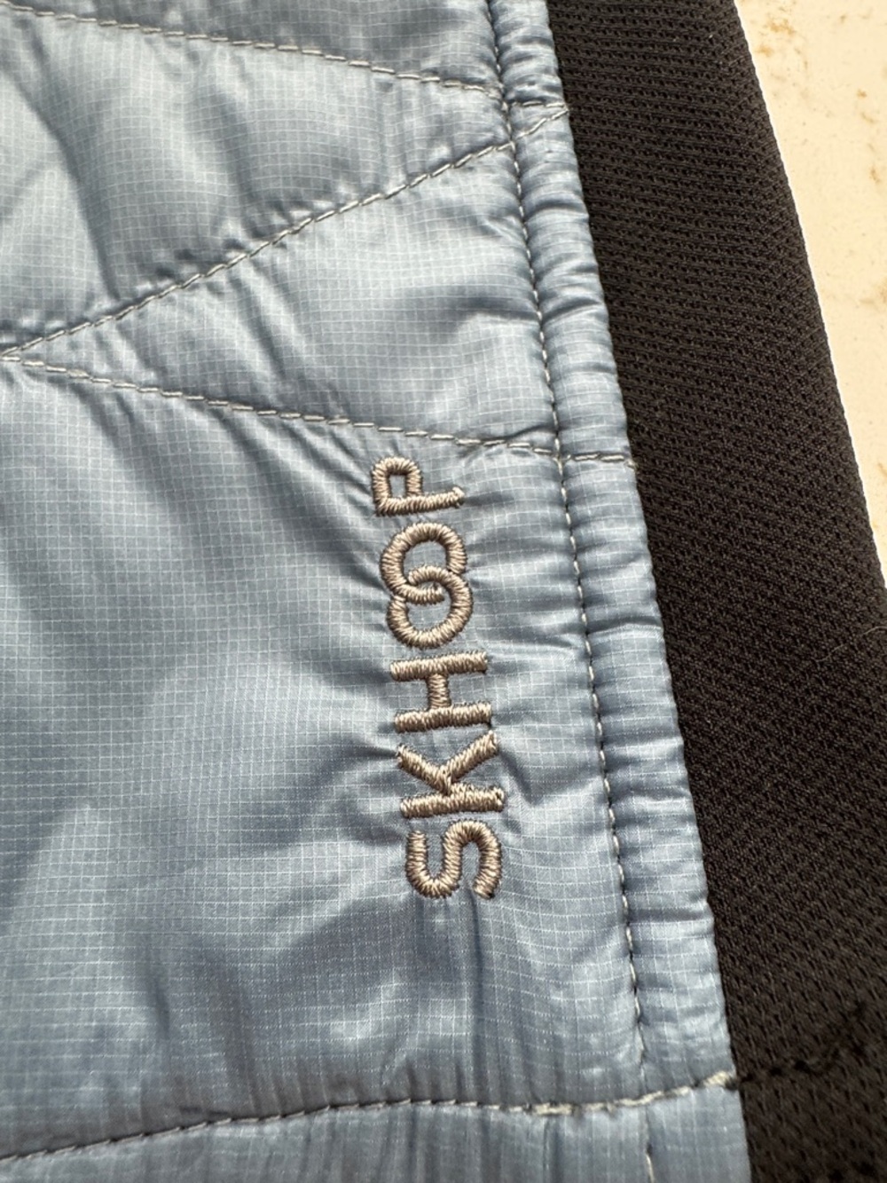 Skhoop Quilted Slate Blue Mini Skirt with Black Side Panels - Picture 6 of 6